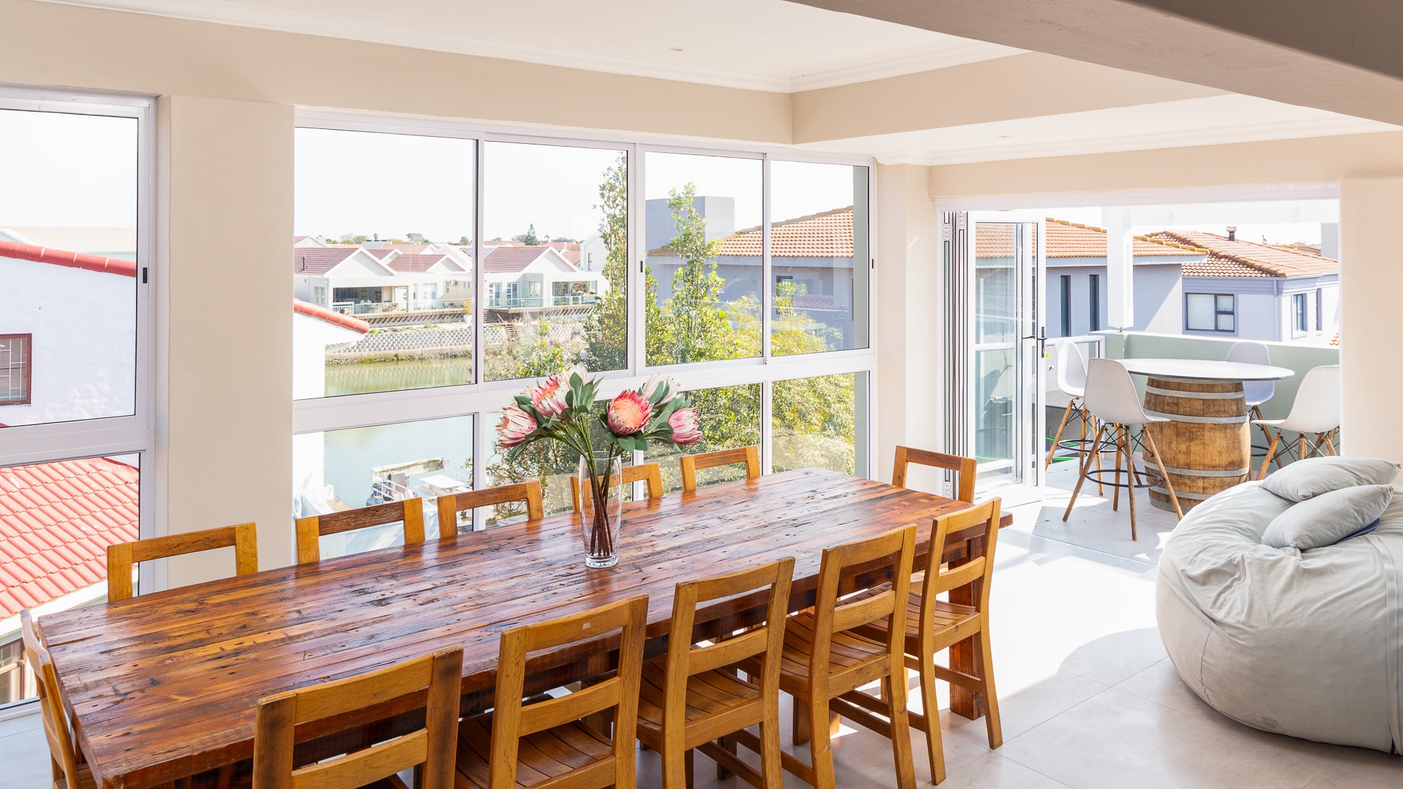 Modern dining room with coastal views