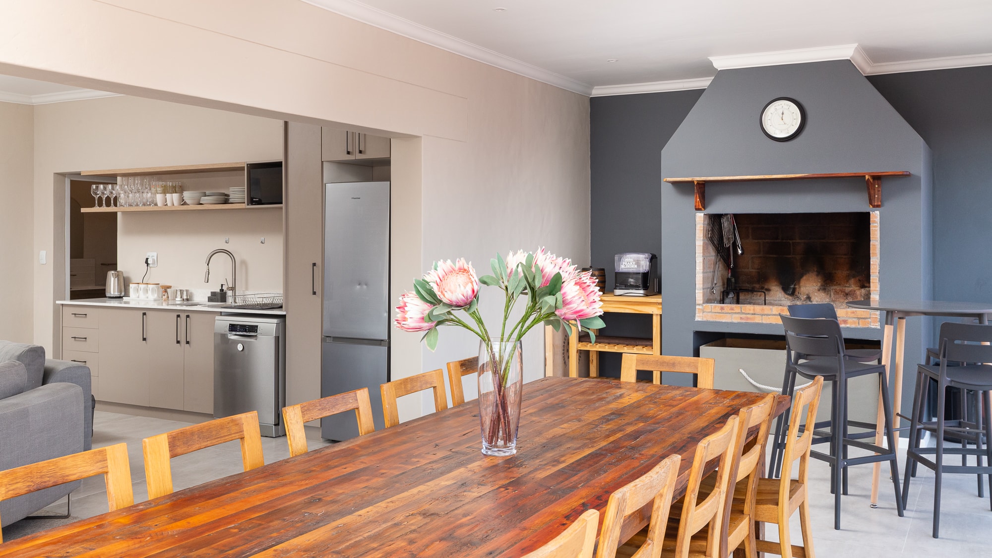 Modern open-plan kitchen dining with fireplace