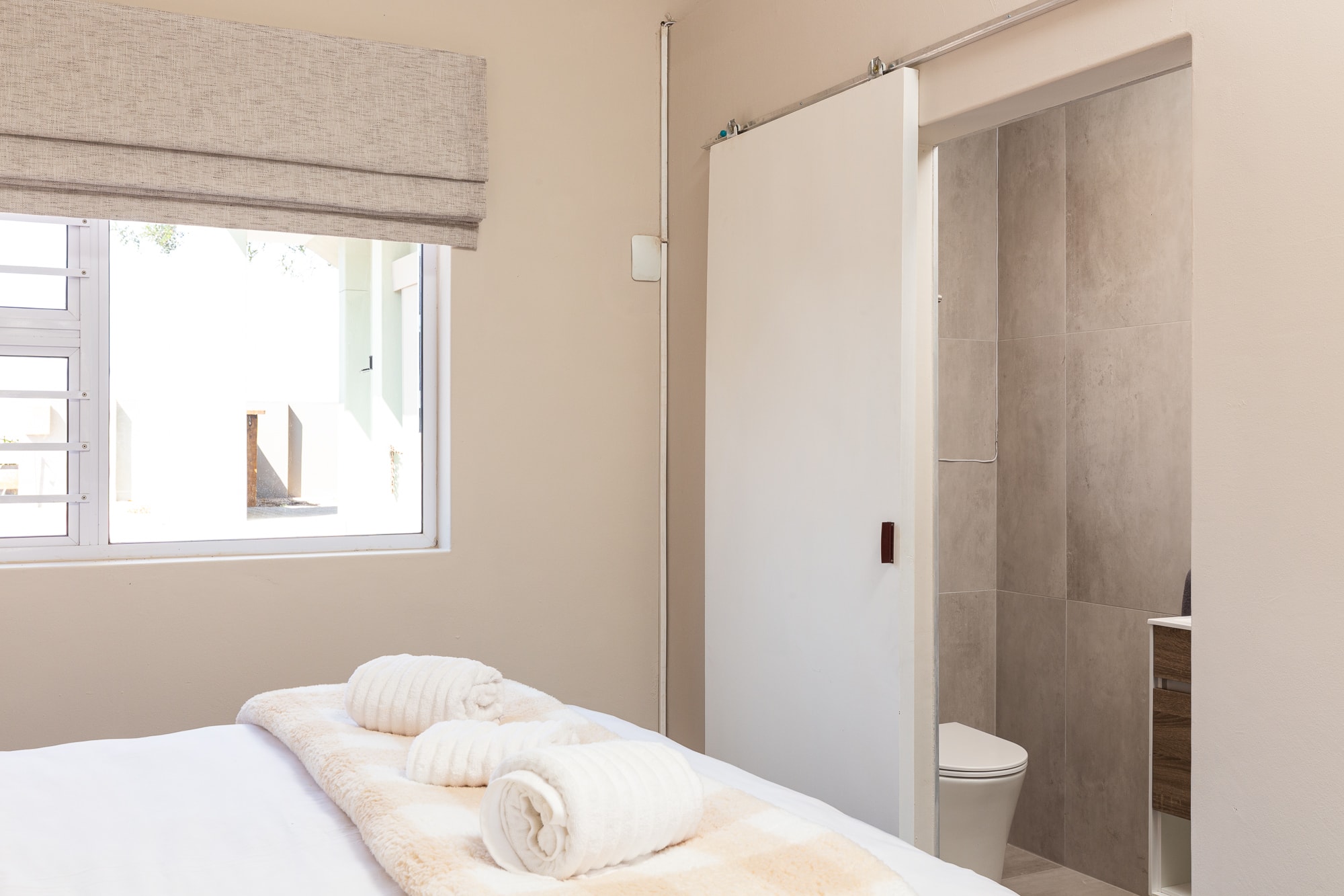 Modern bedroom with ensuite bathroom