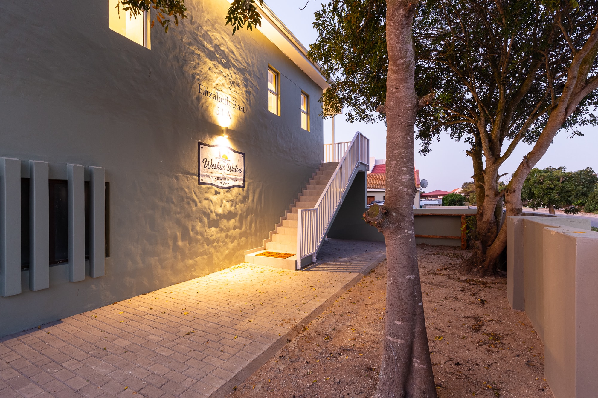 Modern building courtyard with palm trees