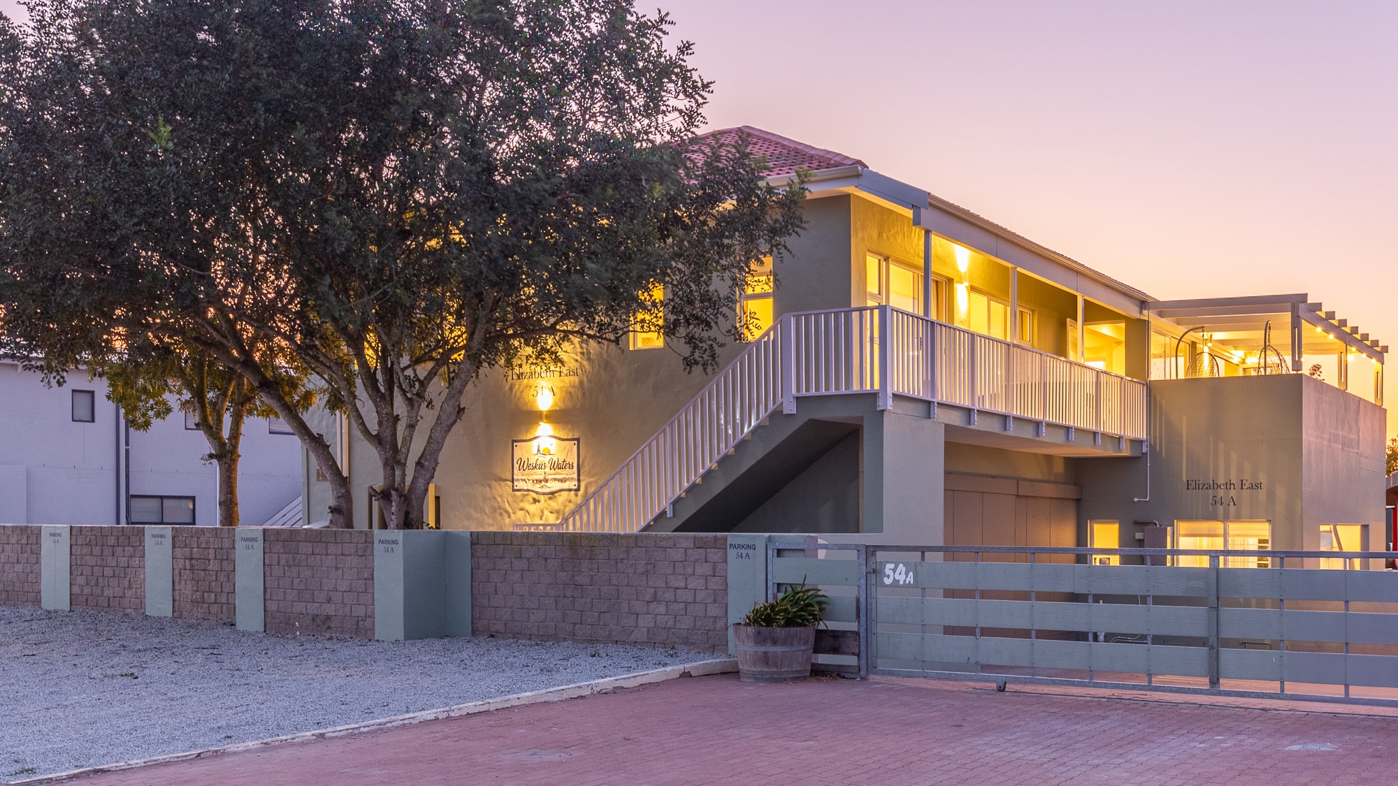 Modern house illuminated at dusk